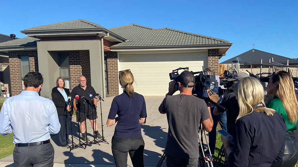 TV news outside a house